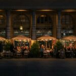 Vibrant bustling ethnic food market in Queens with colorful spices, street food stalls, and international culinary specialties